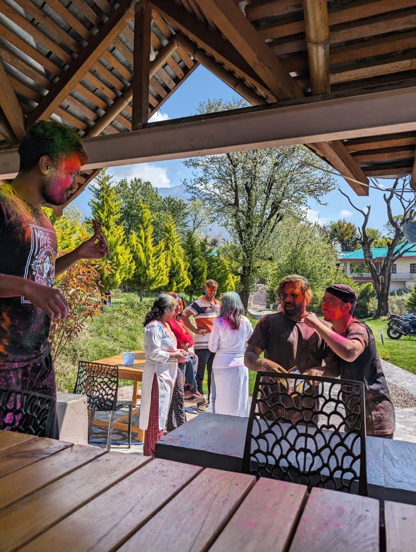 People celebrating Holi festival with colors